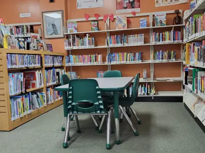 children's section of Cavendish branch with books and toys and table
