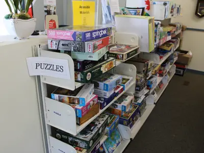 puzzle boxes on shelves